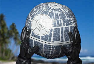 Illustration for article titled An Inflatable Death Star Beach Ball That Lights Up Because Why Not?